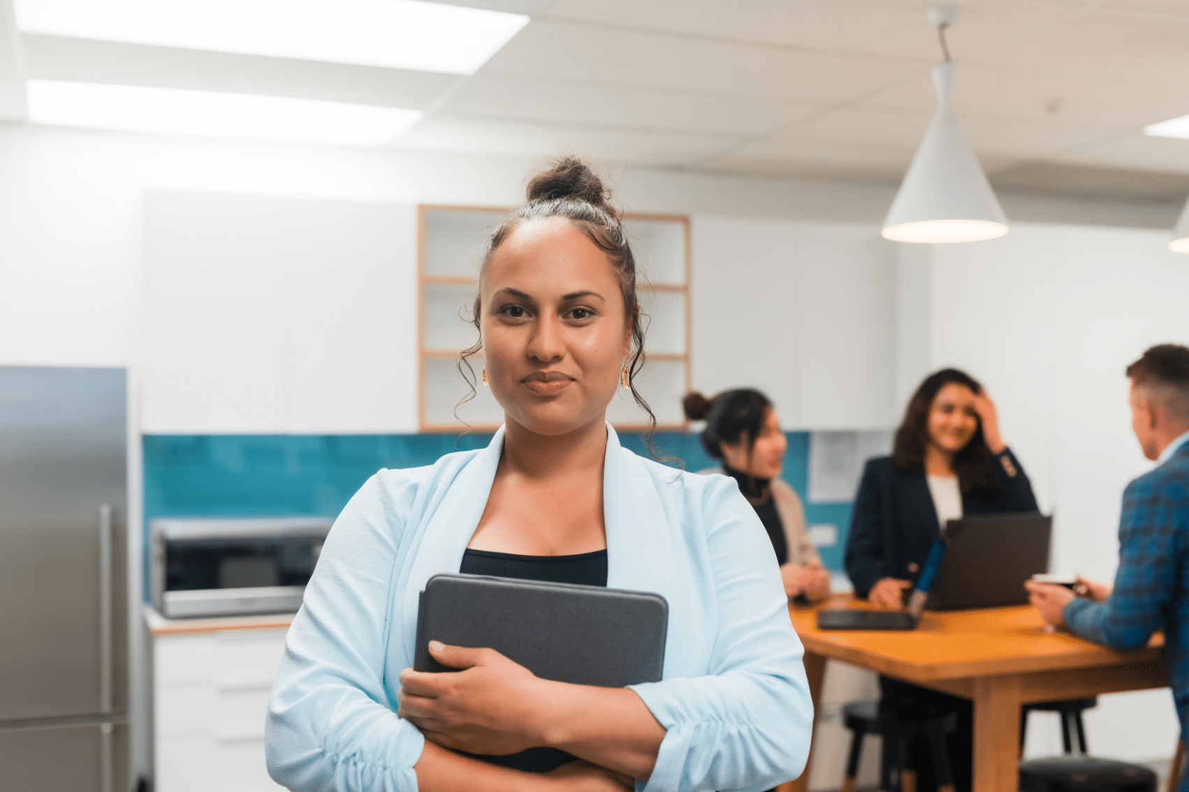 A businesswoman using TMNZ tax pooling for cashflow flexibility