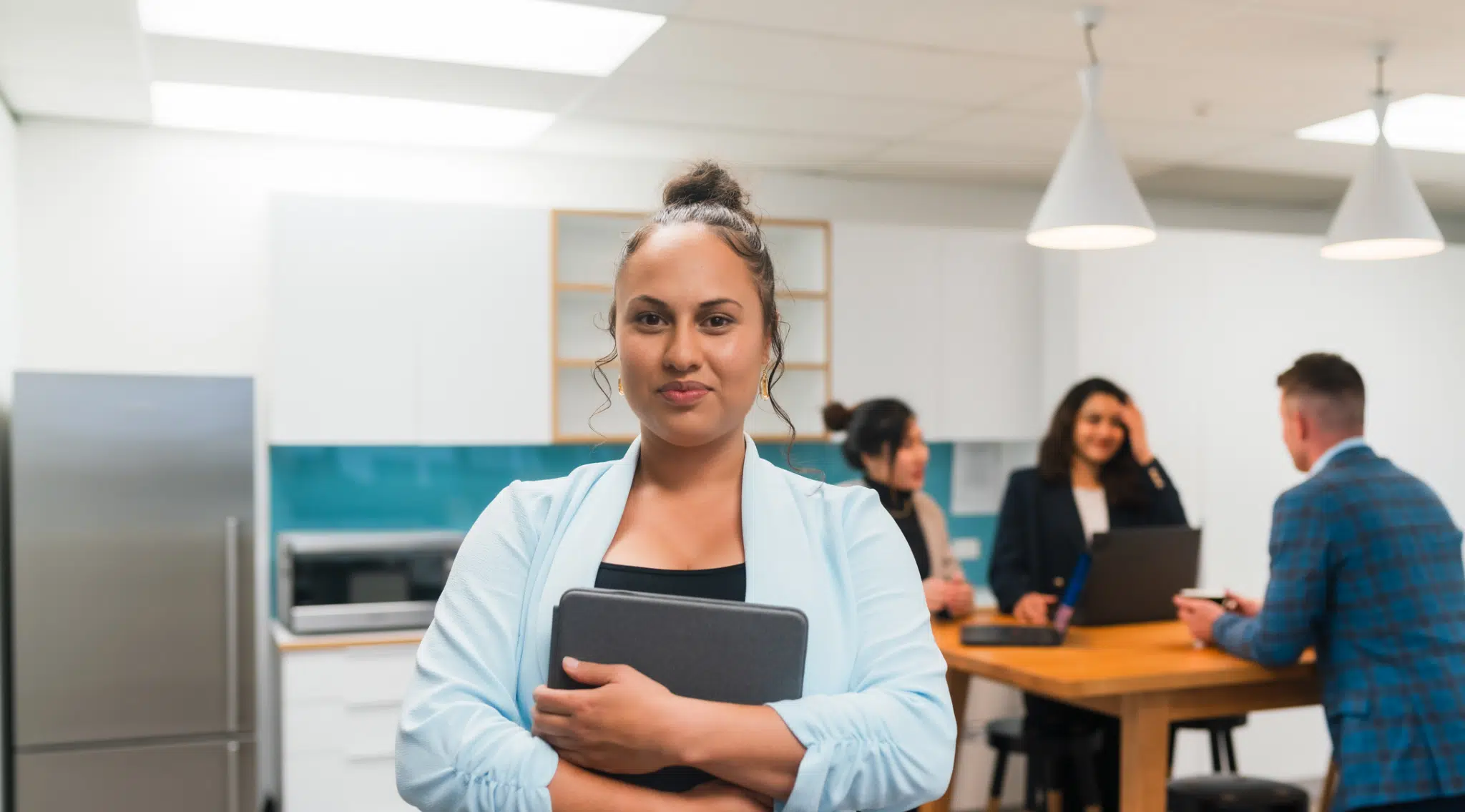 A businesswoman using TMNZ tax pooling for cashflow flexibility